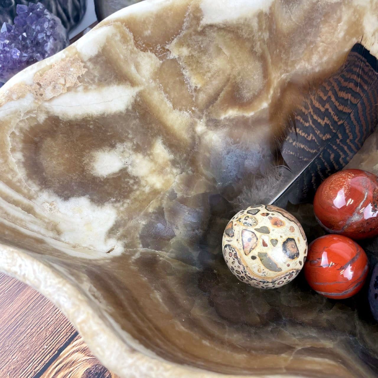 up close shot of Mexican Onyx Bowl with decorations in it