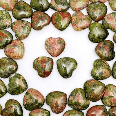 Several Unakite Hearts in a circle around 3 Unakite Hearts