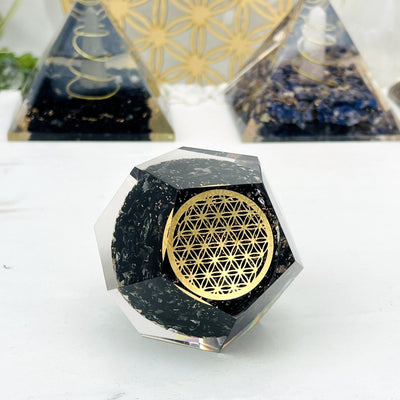 side view of the tourmaline orgone to view shape and thickness