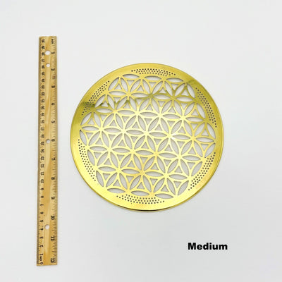 flower of life grid available in medium size. displayed next to a ruler for size reference