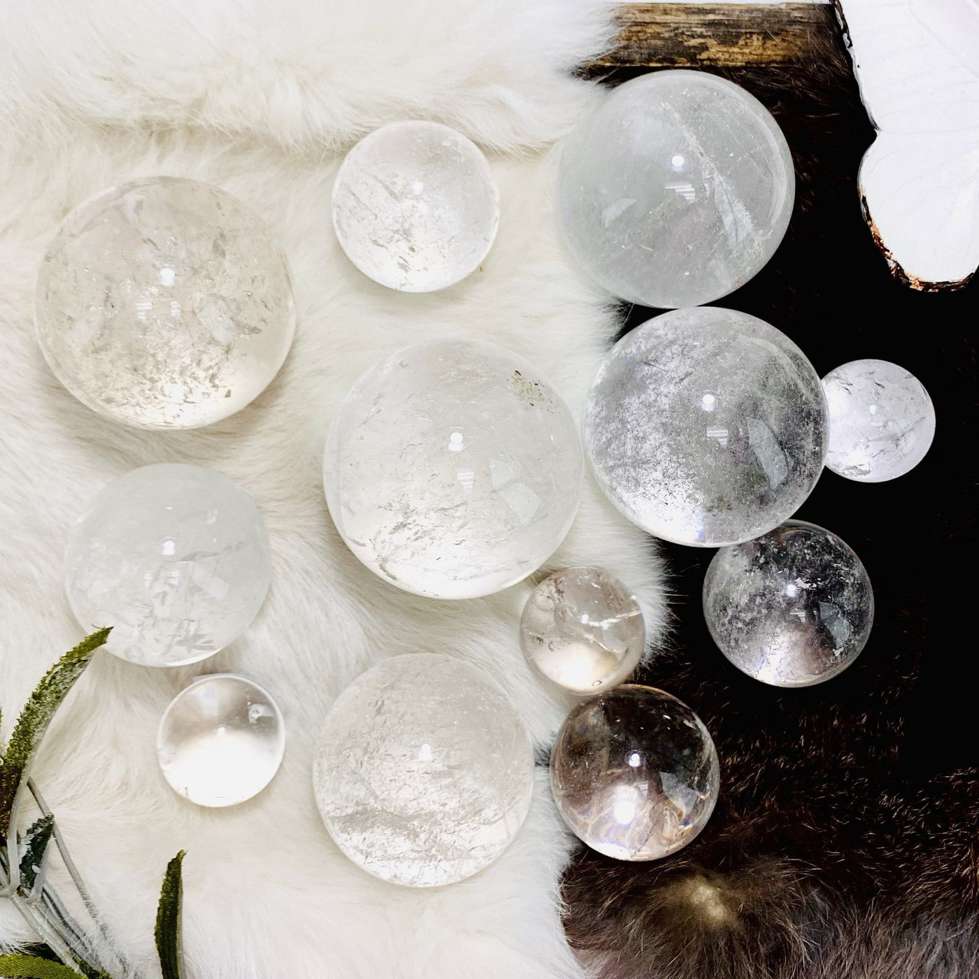 Crystal Quartz Polished Sphere Balls displayed to show size variations