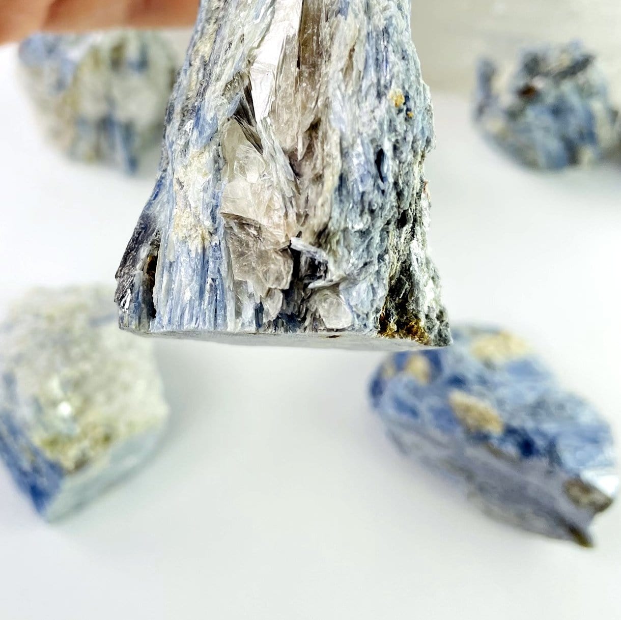 raw blue kyanite displayed to show cut base for decor