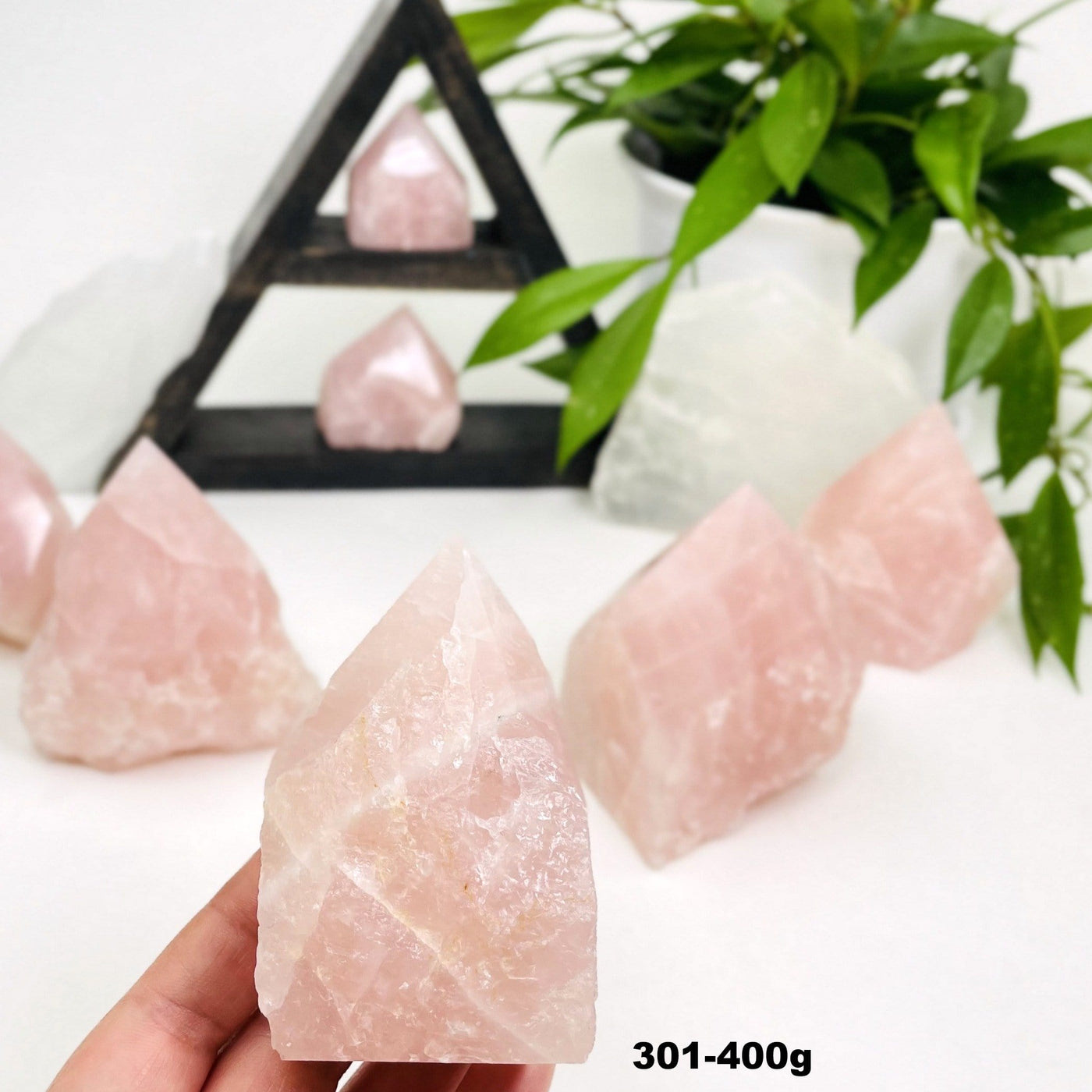 rose quartz semi-polished point showing size in grams