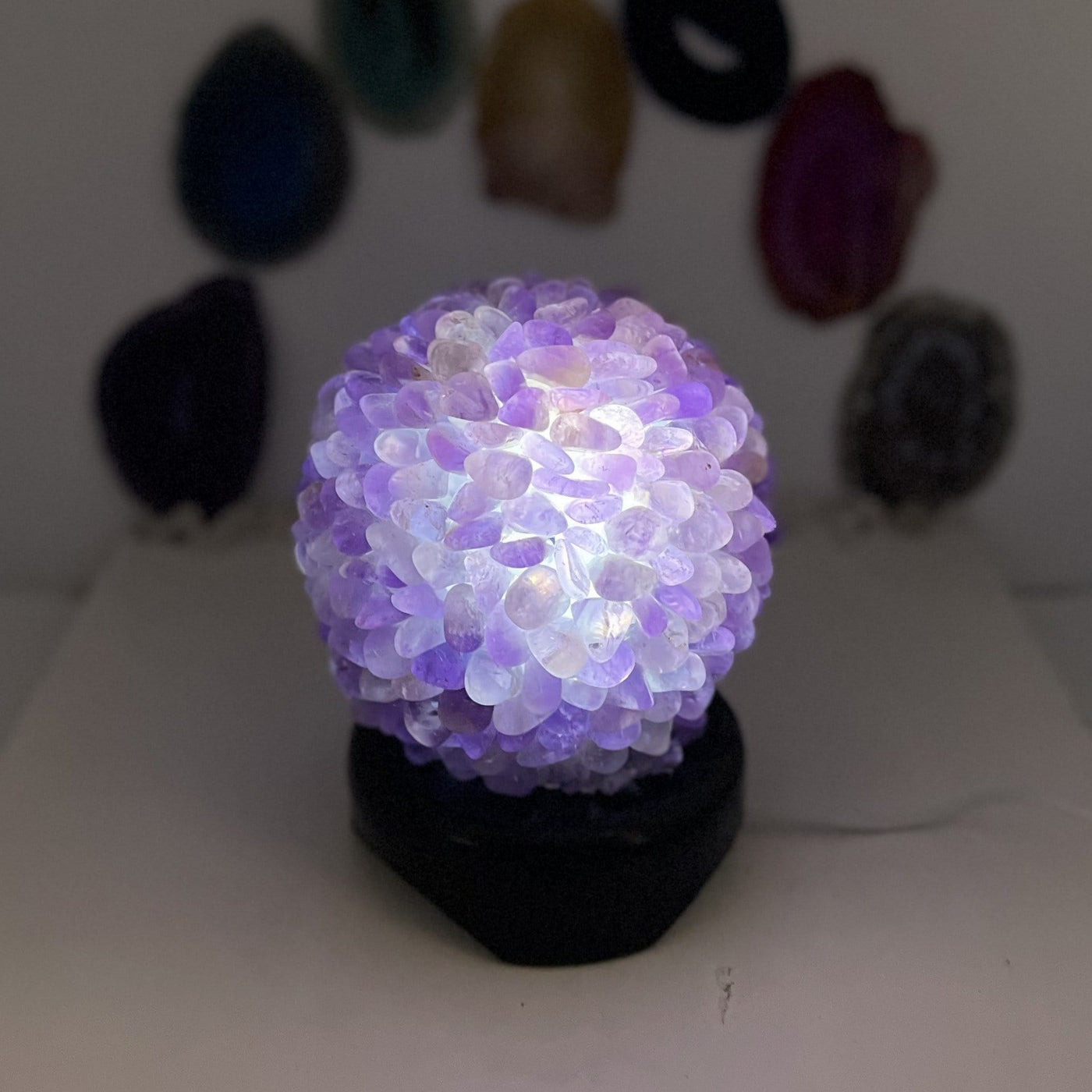 Tumbled Stone Light in amethyst , shown here lit