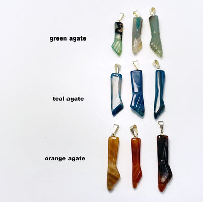 Figa Hand Pendant Protection Stone Amulet next to the crystal names also available in: Green Agate, Teal Agate, and Orange Agate.
