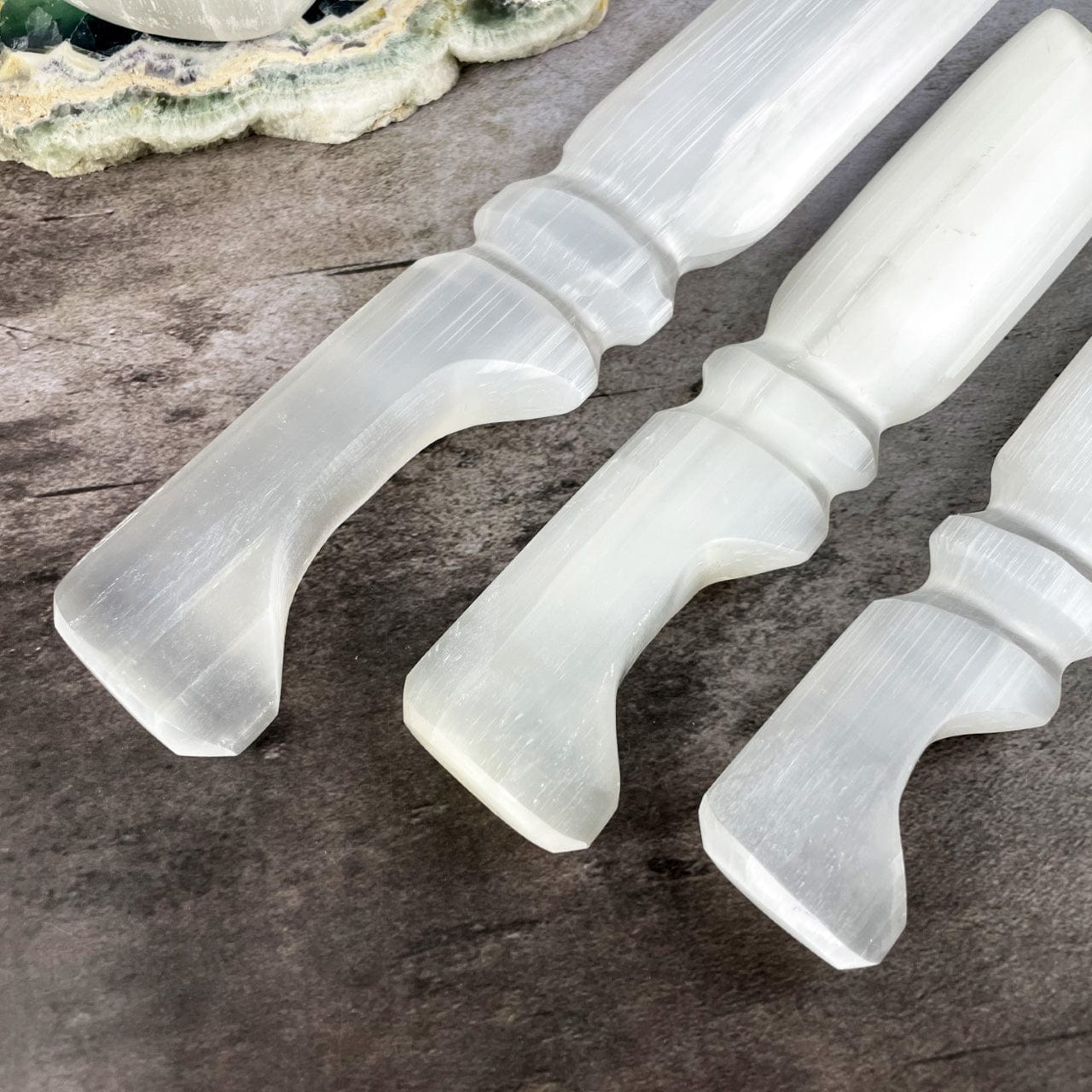 3 sizes of Selenite Knives with Hand Cut and Polished Handles up close