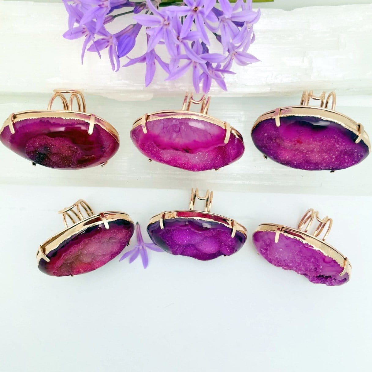 side view of pink agate rings