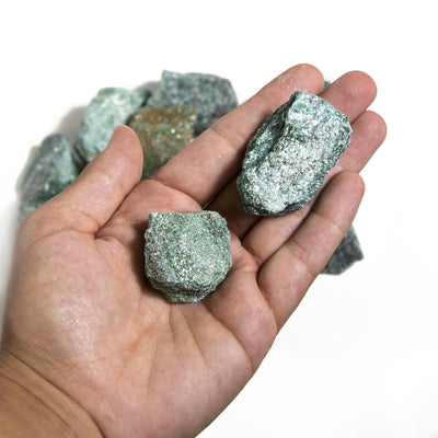 Fuchsite Rough Stones - 2 stones in a hand
