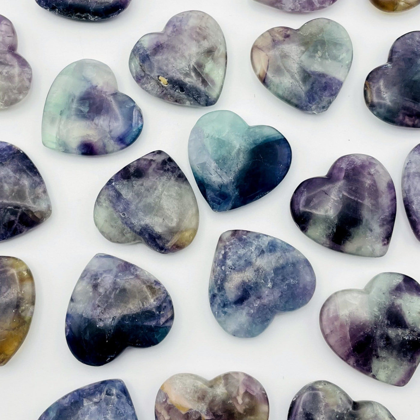 Fluorite Heart shapes displayed to view different color and characteristics