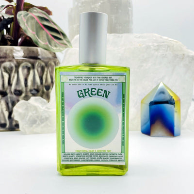 Gemstone Mist - Green Vibrational Color with decorations in the background
