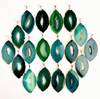 Front facing green agate druzy marquise shape displaying silver and gold pendants. Color and pattern vary.