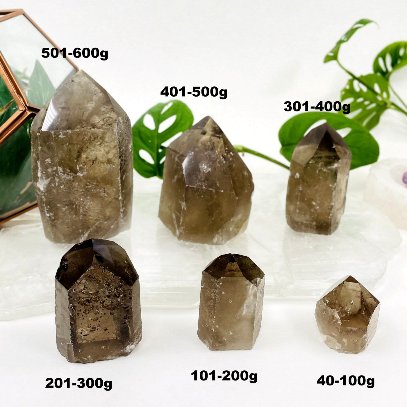 one of each smokey quartz polished point weight options on display