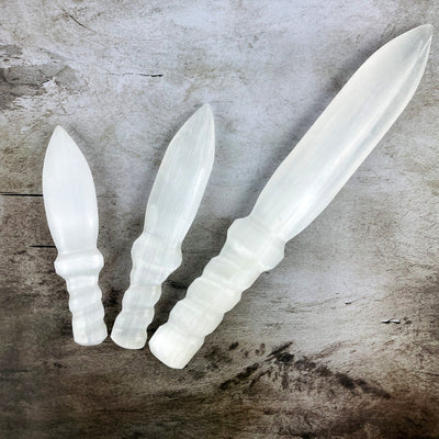 3 sizes of Selenite Knives with Twisted Handles fanned out