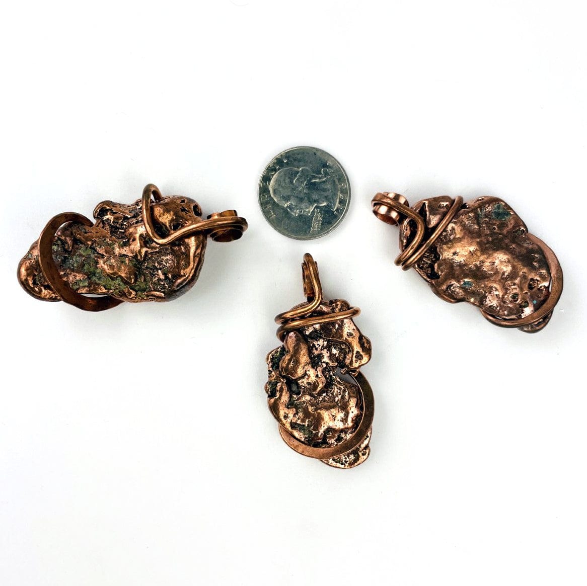 3 Copper Nugget freeform pendants with a quarter for size reference