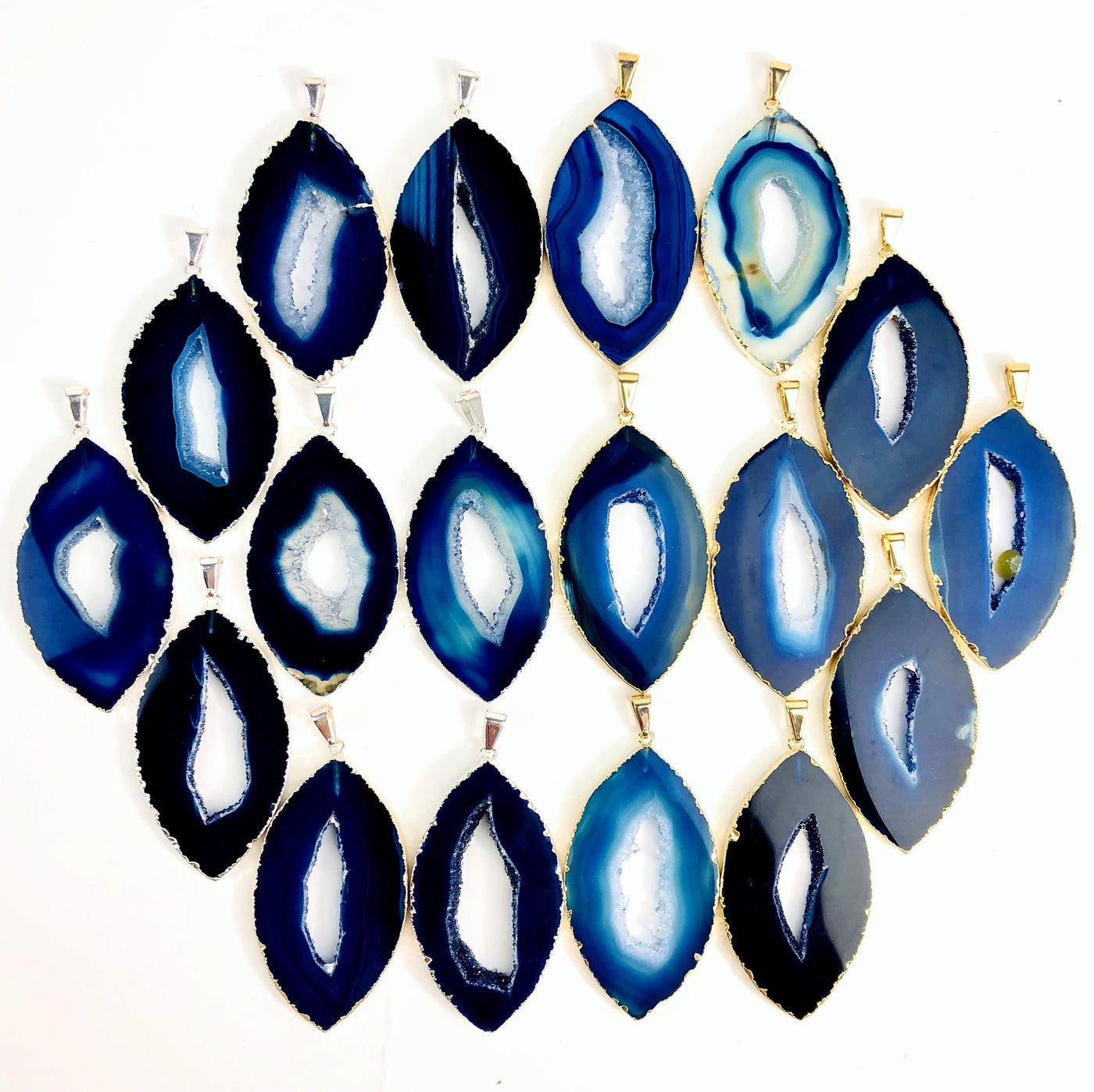 Front facing blue agate druzy marquise shape displaying silver and gold pendants. Color and pattern vary.