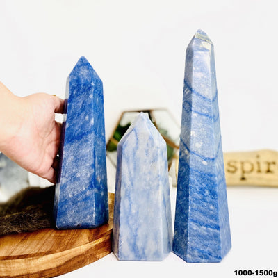 Three Blue Quartz Tower Points weighing at 1000-1500g in a variety of sizes