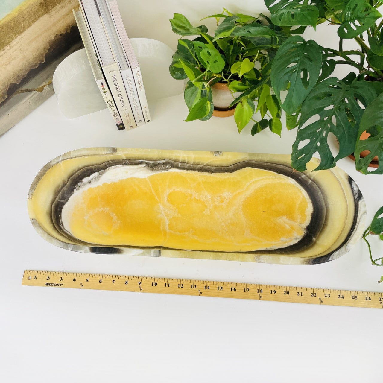 Mexican Onyx Oval Bowl looking down into bowl next to a ruler for size reference