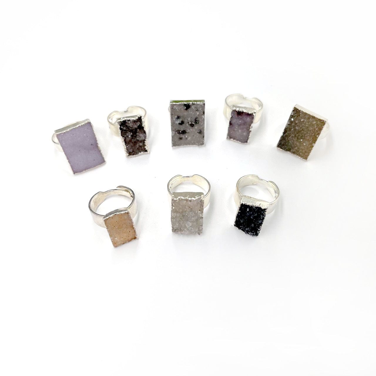 Quartz Druzy Rectangle Adjustable Rings in silver showing different colors of druzy