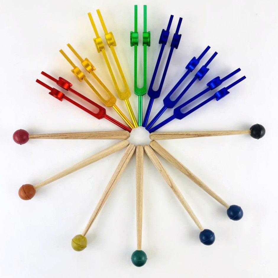 A Circle of All the 7 Chakra Tuning Forks and Mallets