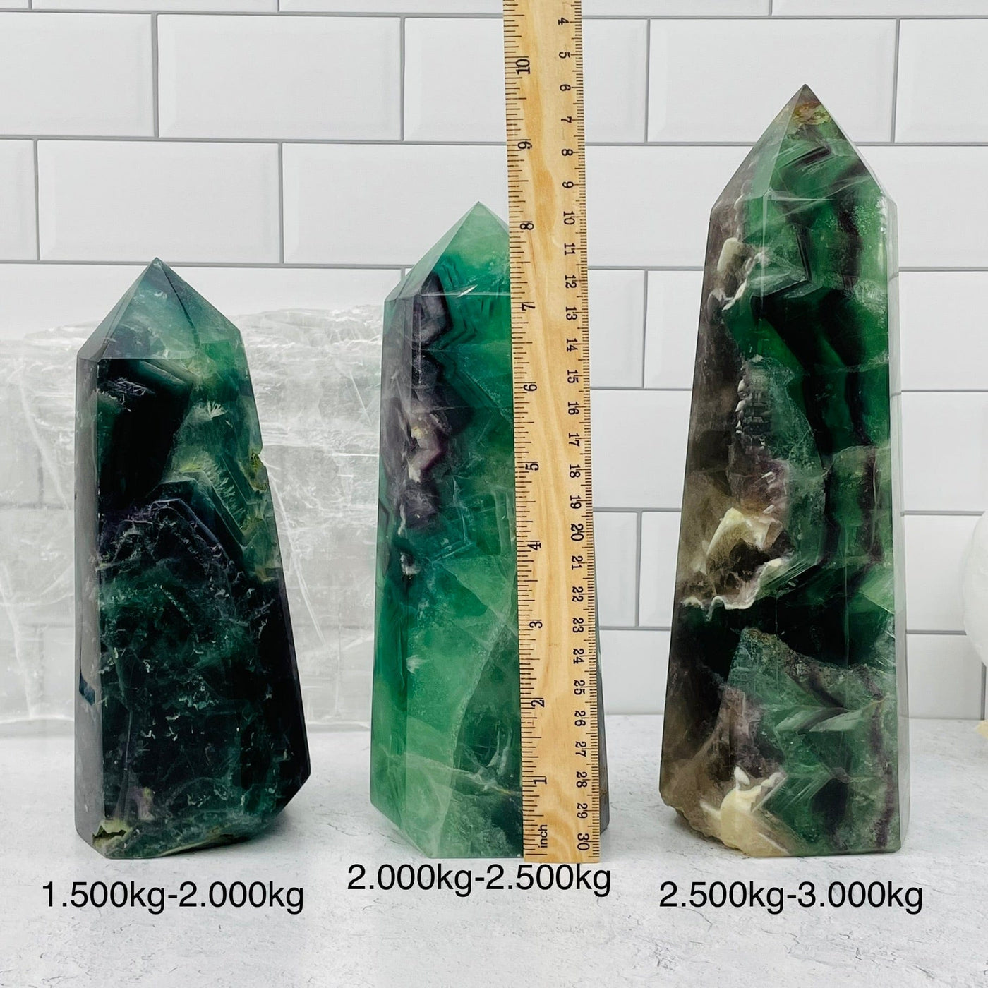Rainbow Fluorite Polished Point Towers sold by weight