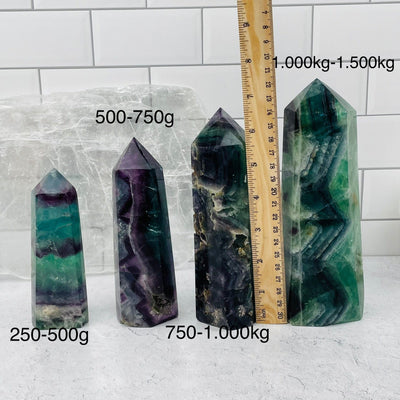 Rainbow Fluorite Polished Point Towers sold by weight 