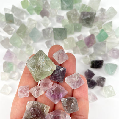 Rainbow Fluorite Octahedron Cubes in hand for size reference 