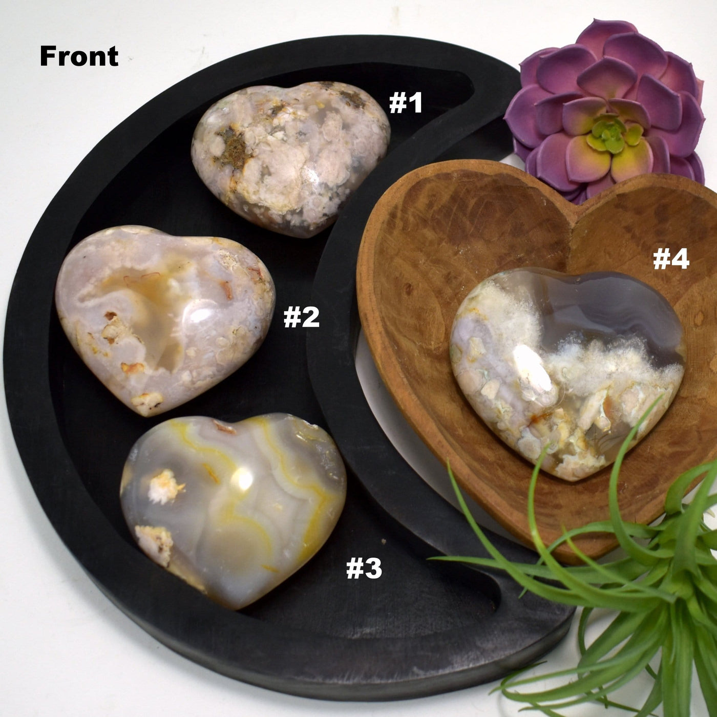 4 different Flower Agate Polished Stone Heart showing the front side.