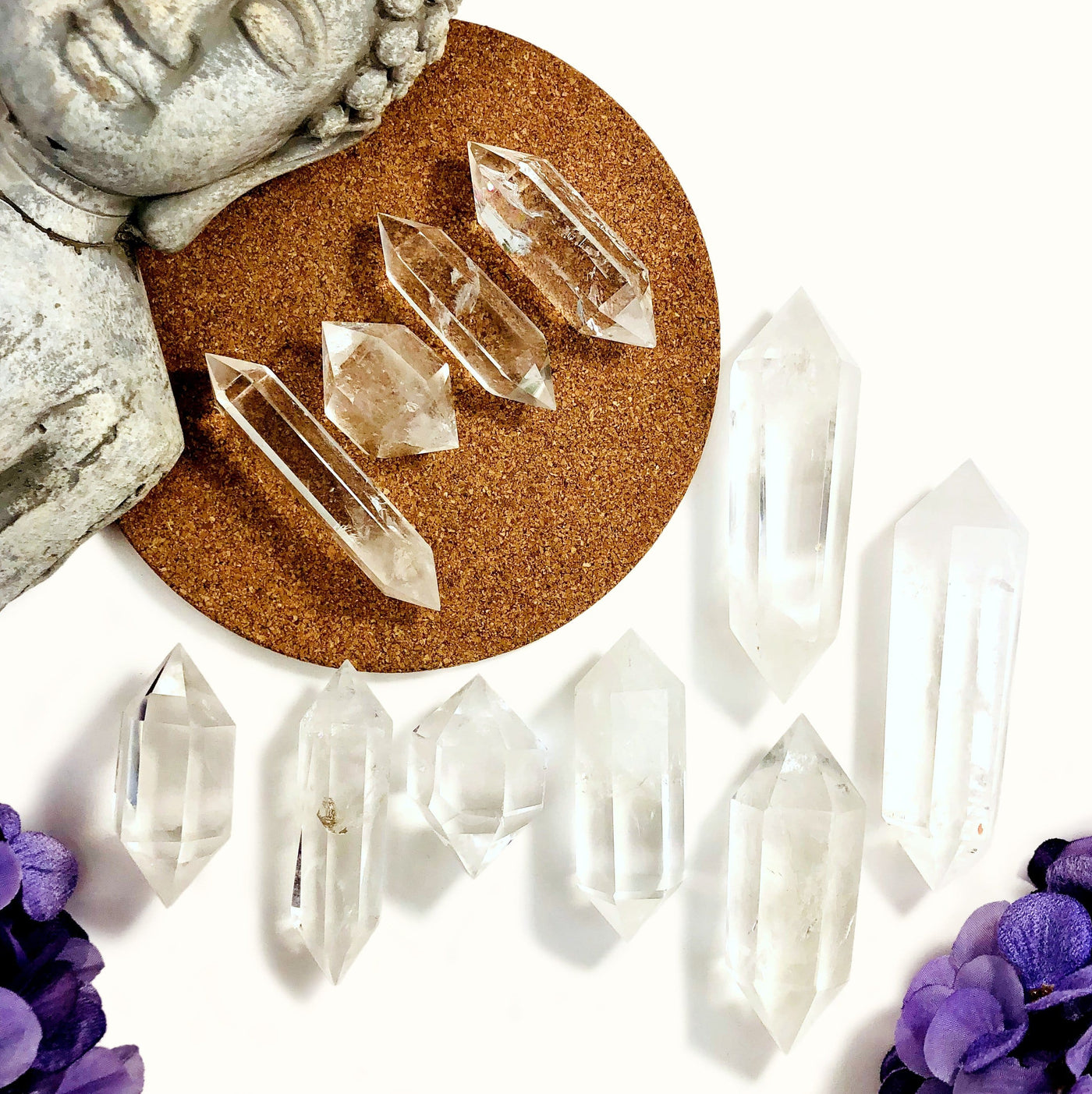Crystal Quartz Double Terminated Points layed out on a table showing different sizes