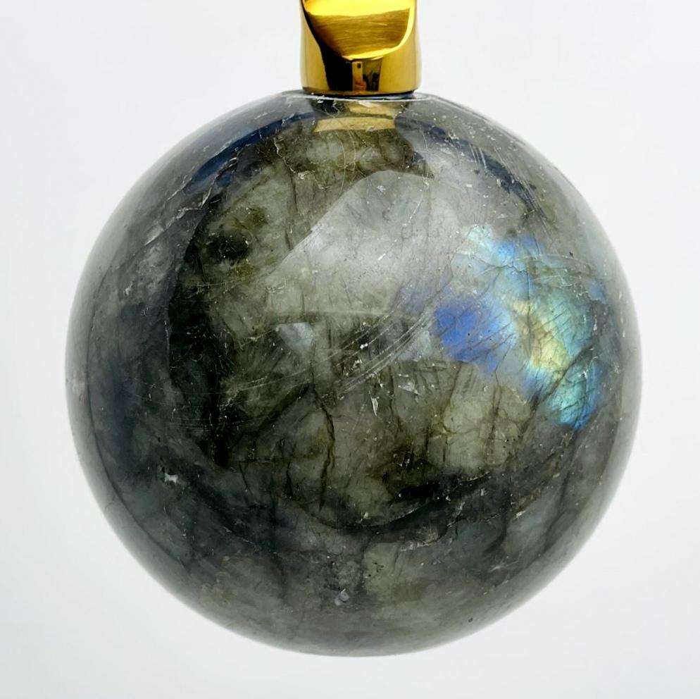 Close up of the labradorite sphere in the opener to show it has flash.