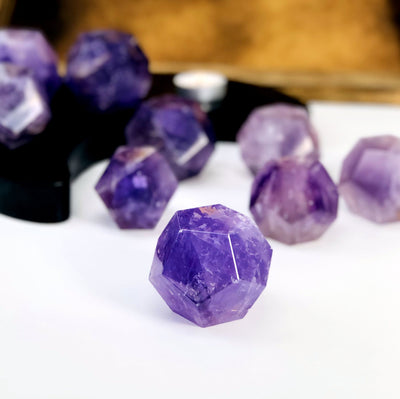 Amethyst Dodecahedron Stones -- front shot view of dodecahedron for detail of tone.