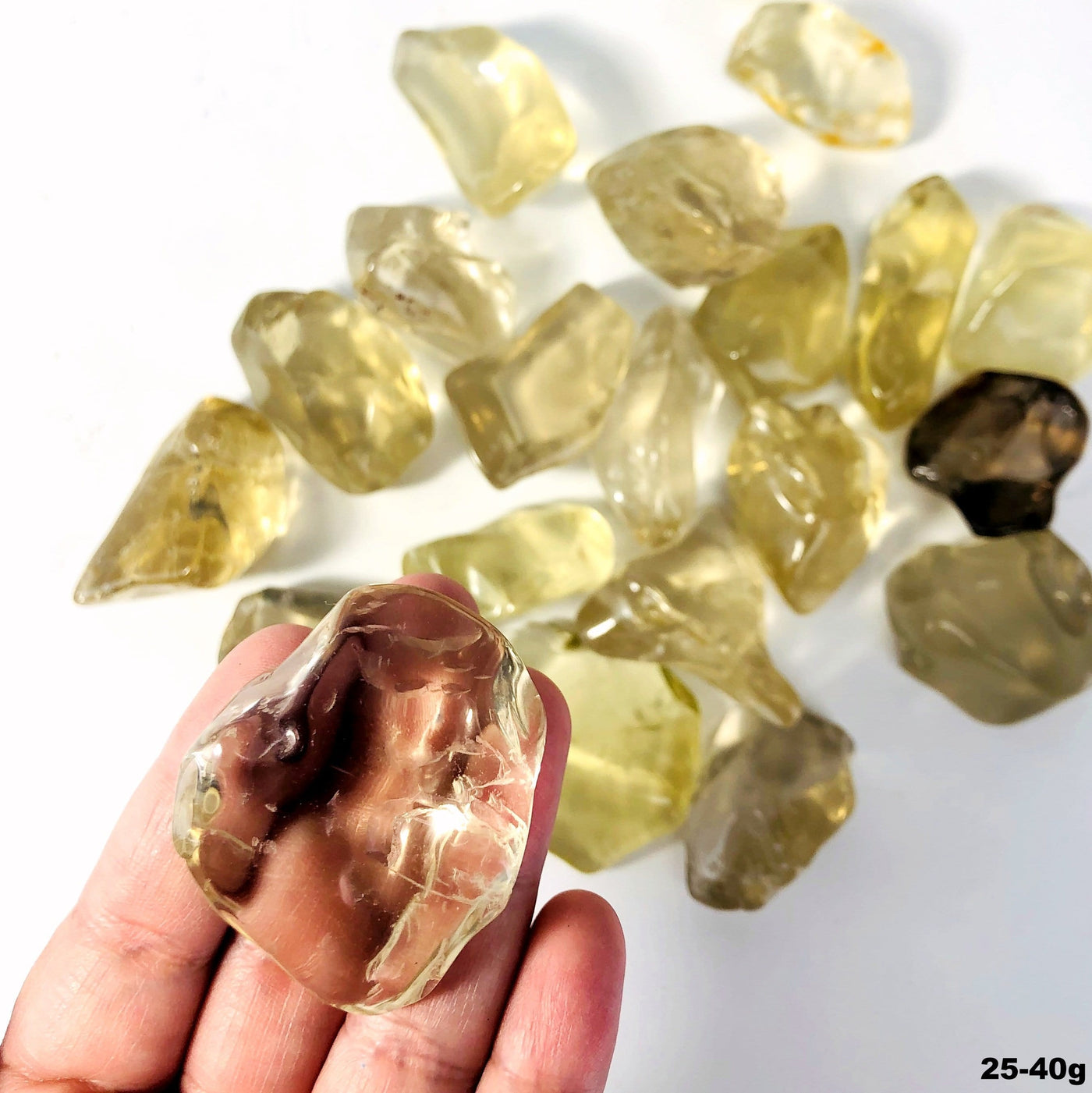 close up of citrine in a hand