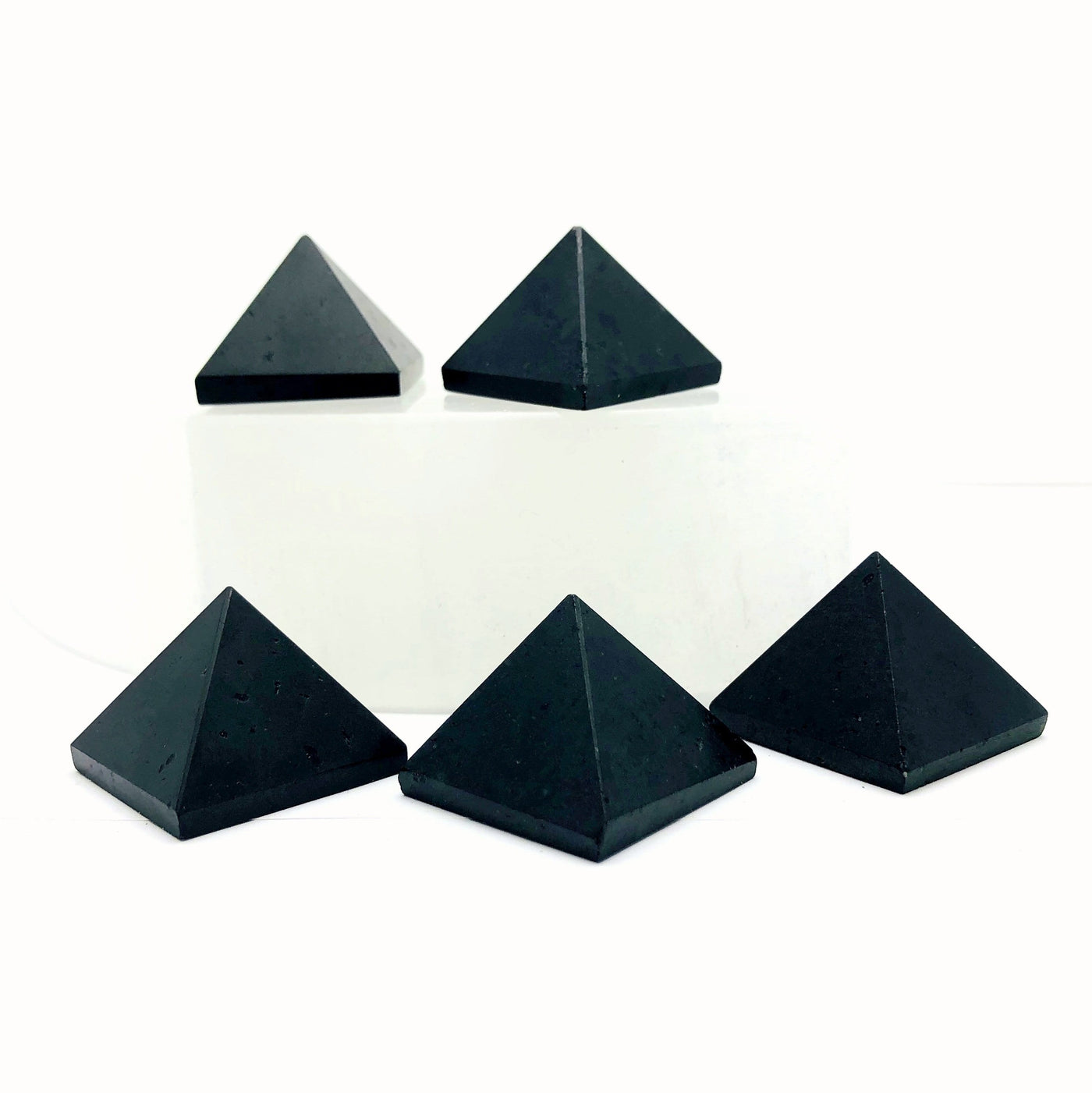 Front view of Black Tourmaline Pyramid on a white background
