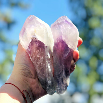 amethyst with phantom points in a hand