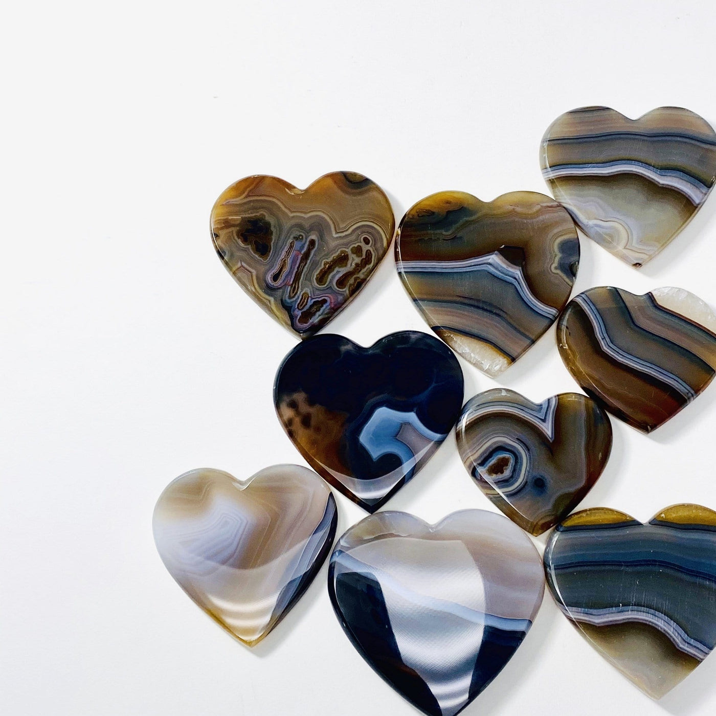 Natural Agate Heart Slices shown on a white background.