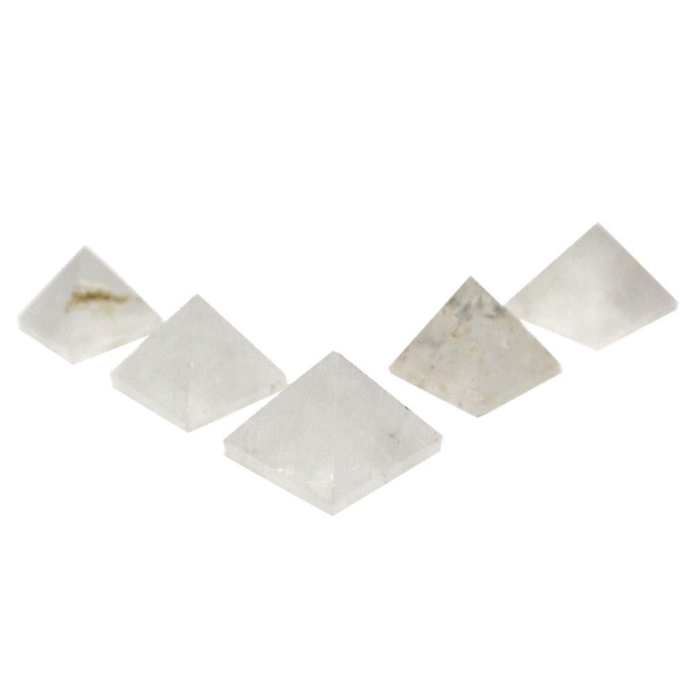 multiple crystal quartz pyramids displayed to show the differences in the sizes 