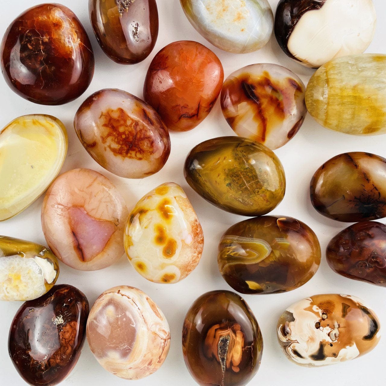 Carnelian Agate Tumbled Stones showing color and shape variation