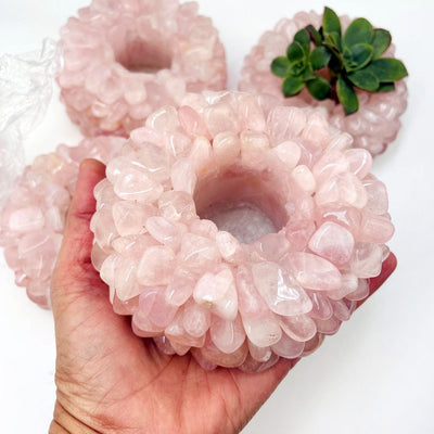 Rose Quartz Tumbled Crystal Candle Holders one in a hand