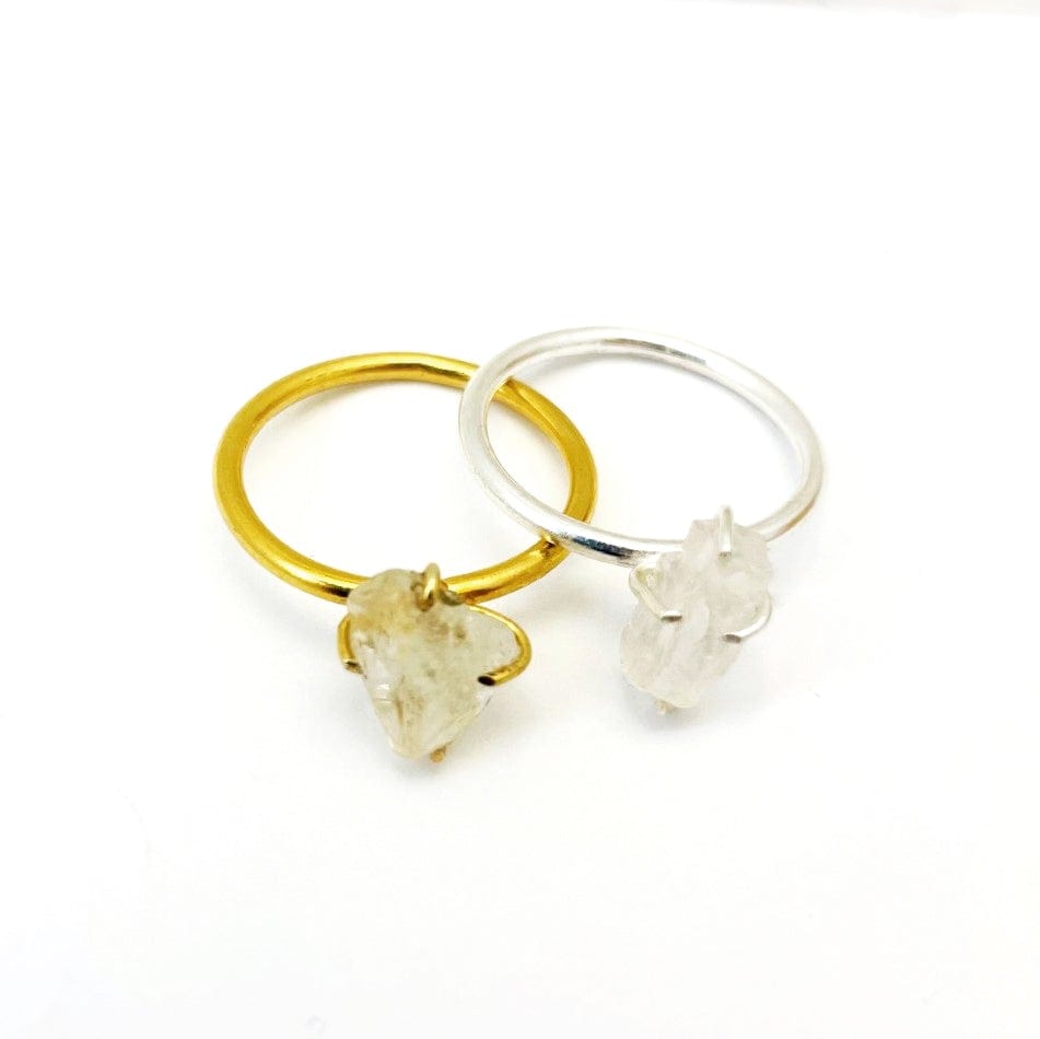 gold and silver rough crystal gemstone ring shown on a white background