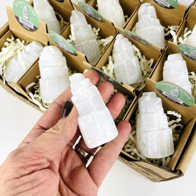 Point of Purchase Box of 32 smaller boxes with Selenite towers in each, one in had