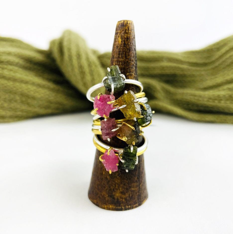 Watermelon Tourmaline Gemstone Rings in Gold and Silver stacked on display
