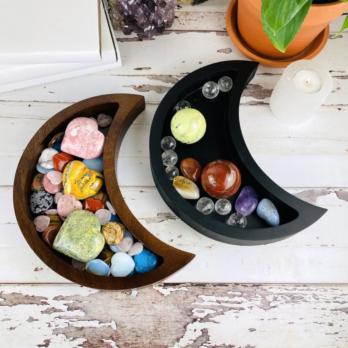 Black and Brown Crescent Moon Wood Trays displayed with crystals inside that are not included