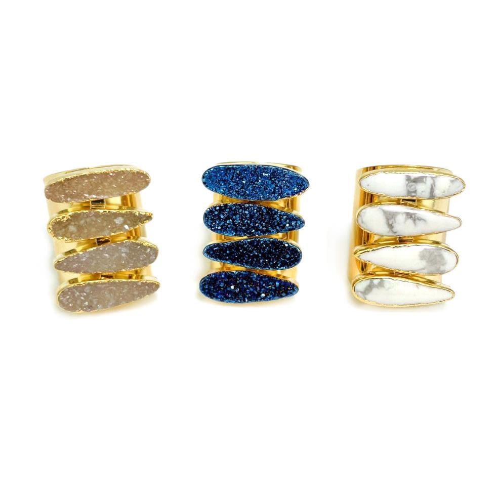 An Adjustable Teardrop Druzy Ring with Electroplated 24k Gold Adjustable Cigar Band in colors Natural Druzy, Mystic Blue Titanium Druzy, White Howlite