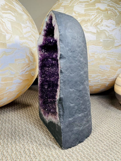 Amethyst Crystal Cathedral Geode side view showing treated backside