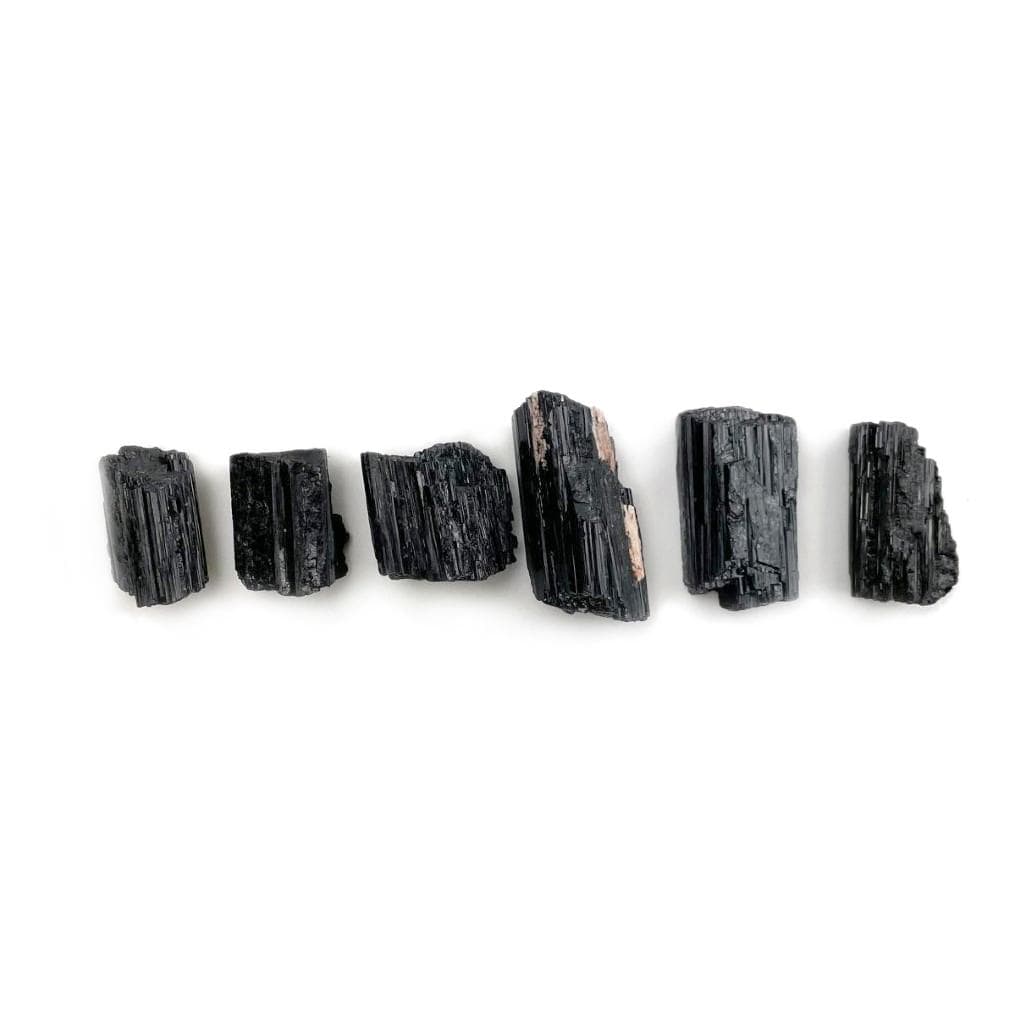 Black Tourmaline lined up for size reference