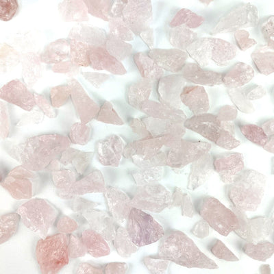 Rose Quartz Stones spread out on a table