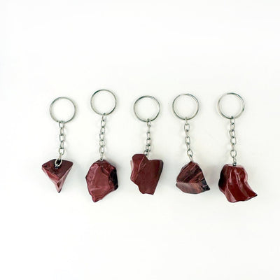 Red Jasper 5 Polished Freeform Silver Toned Key Chains showing shape and color variation