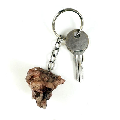 Lithium Cluster Keychain shown with a key on the ring