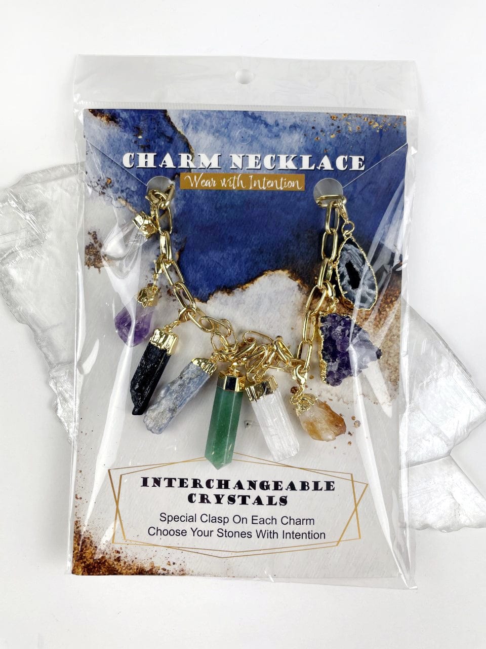 Gemstone and charms Necklace in gold in its packaging on a cute card