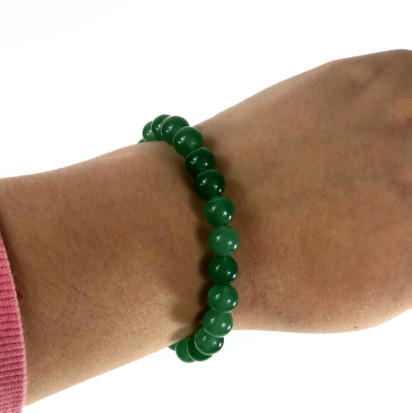 green aventurine healing stone bracelet being worn with white background