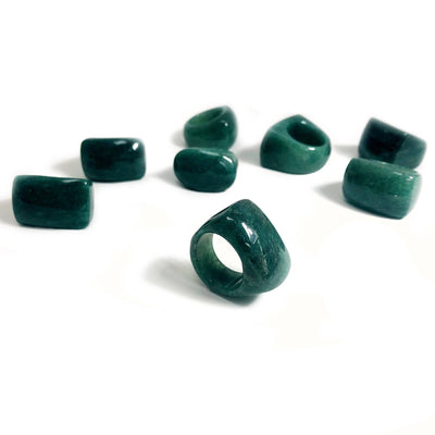 green quartz rings on a white background.
